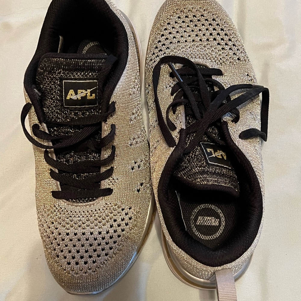 APL Knit Sneakers in Black and Gold